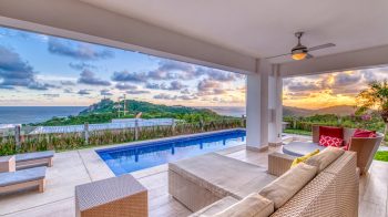 Terrace with pool and view of the San Juan del Sur bay.