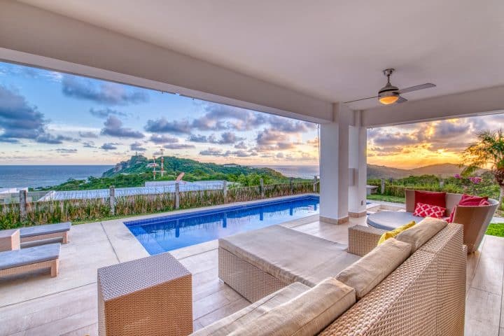 Terrace with pool and view of the San Juan del Sur bay.