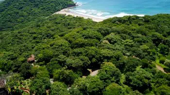 This lot is in the gated community of Costa Dulce.