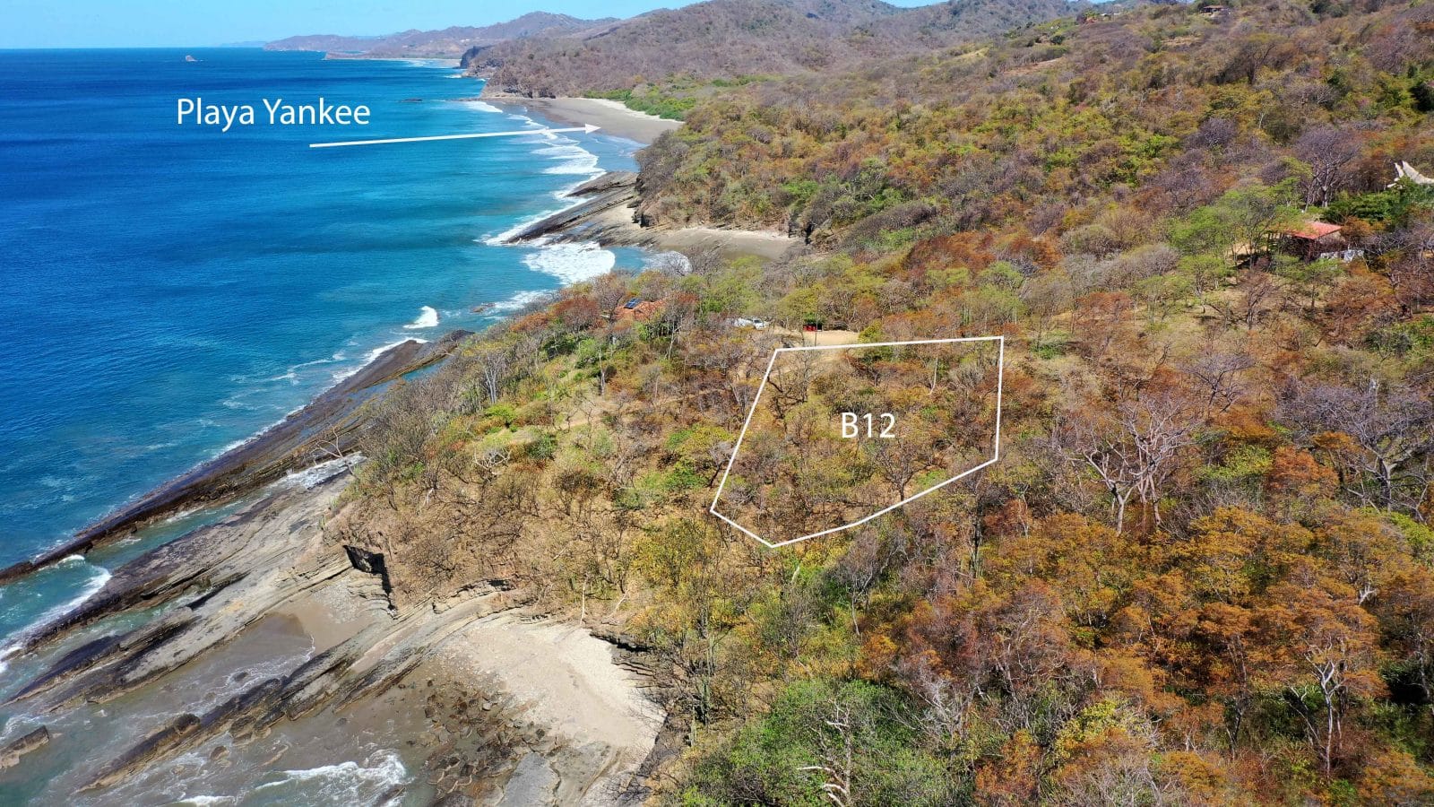 The space below the lot is green area in the master plan.