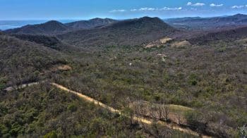 Welcome to this large lot with no building restrictions and an ocean view.