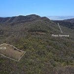 This large lot with no restrictions and an ocean view is less than 10 minutes by car to Playa Hermosa.