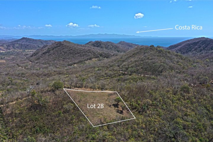 Welcome to this large lot with no building restrictions and an ocean view.