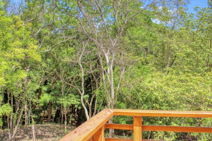 Roof level decks on at the jungle house on land make seeing your estate a breeze.