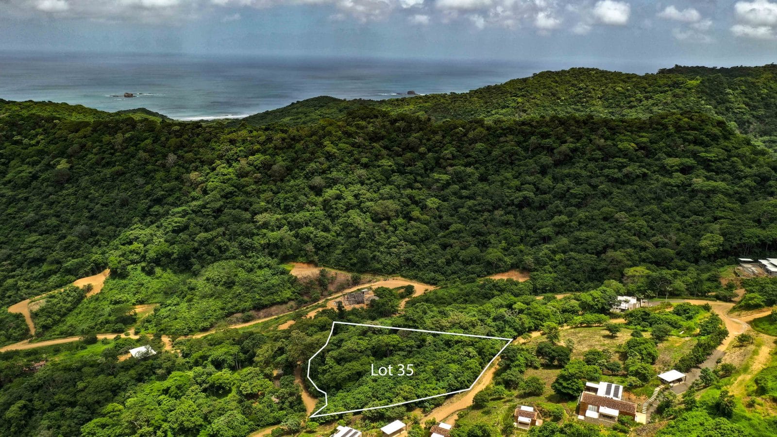Ocean views can be seen from this wooded acreage in Big Sky Ranch