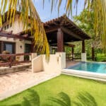 Tropical Balcony with Pool and Garden.