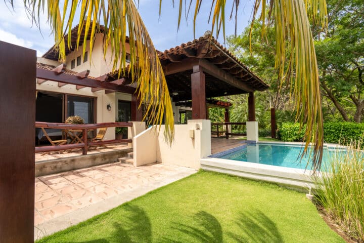 Tropical Balcony with Pool and Garden.