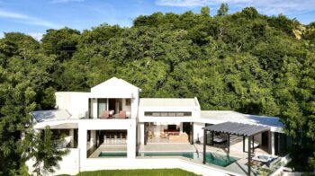 Aerial Photo of Villa Artista, modern home with large pool.