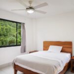 Guesthouse bedroom above carport