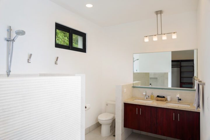 Masted bathroom with dual vanity