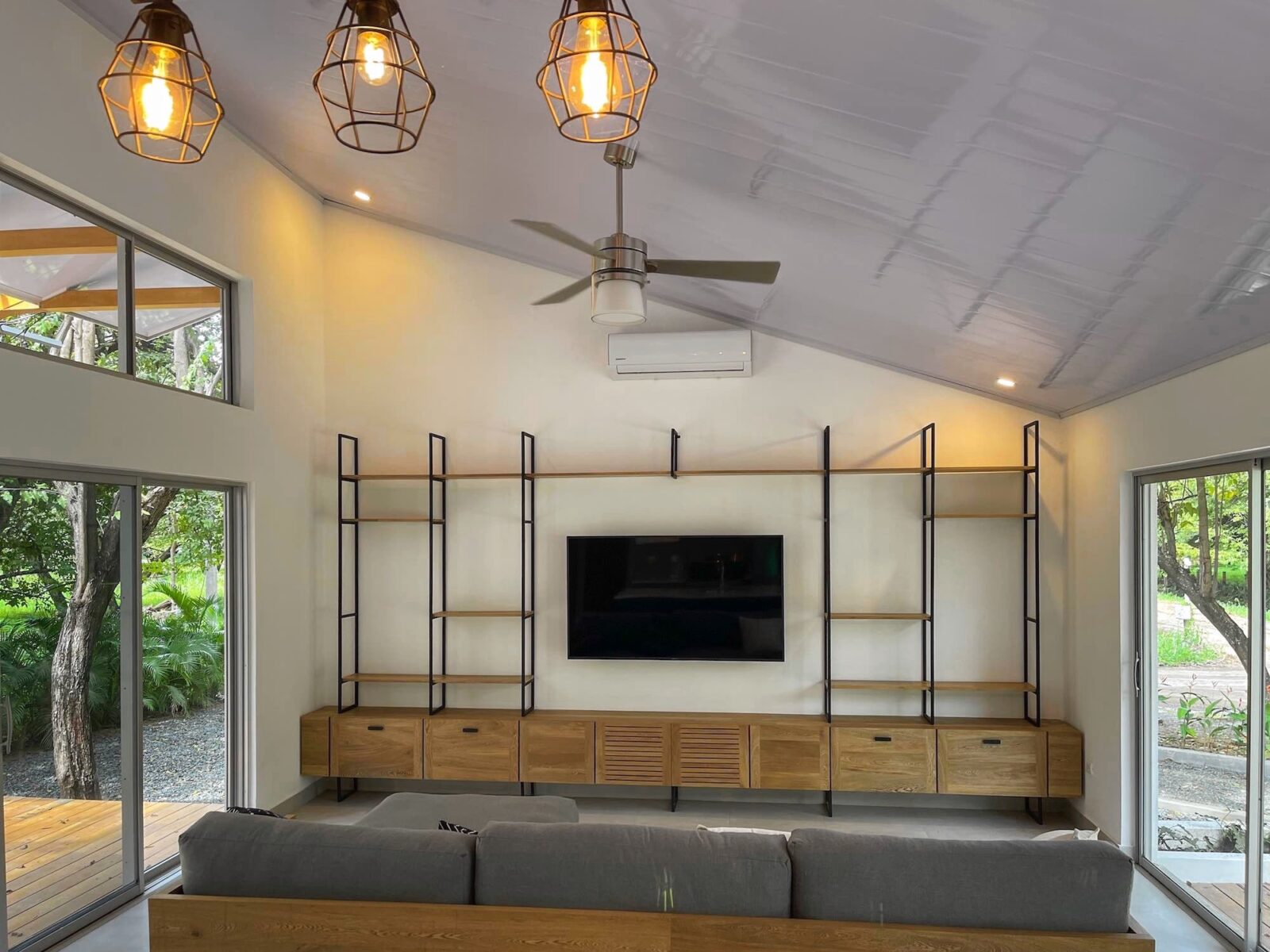 Living room with TV and sofa photo