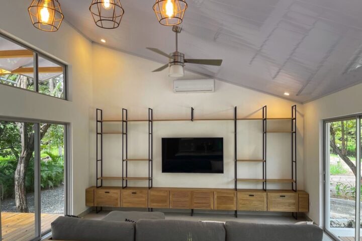 Living room with TV and sofa photo