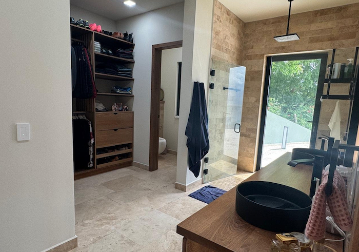 Walking closet and bathroom from the sink
