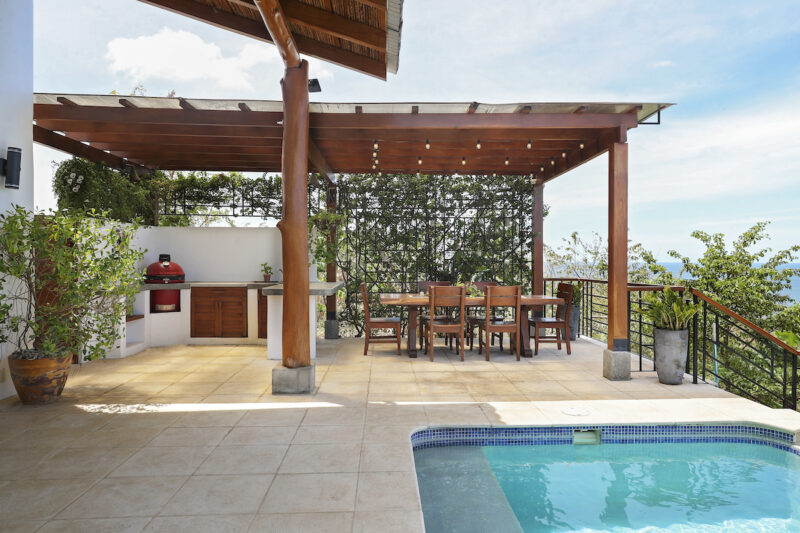 Outdoor kitchen and pool view