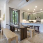 Open kitchen and dining island at this Beachfront Pacific Condo