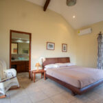 bedroom with complete bathroom in Playa Maderas Cliff-Front Estate