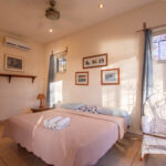 bedroom with ceiling fan in Playa Maderas Cliff-Front Estate