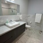 A full bathroom in the oceanview rental-ready condo