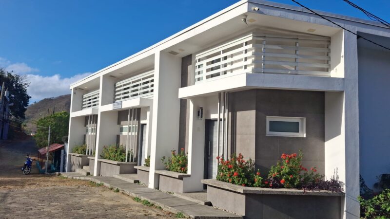 Front exterior of the boutique three-unit building