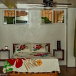Colonial Surf Retreat bedroom with a double bed