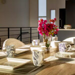 Open dining, kitchen, and stairwell