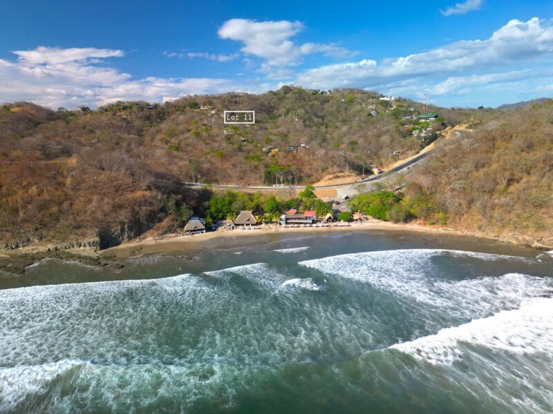 New coastal road winding below the property