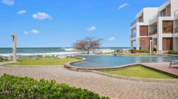 Luxury Beachfront Condo at Hacienda Iguana with an infinity pool above the Pacific