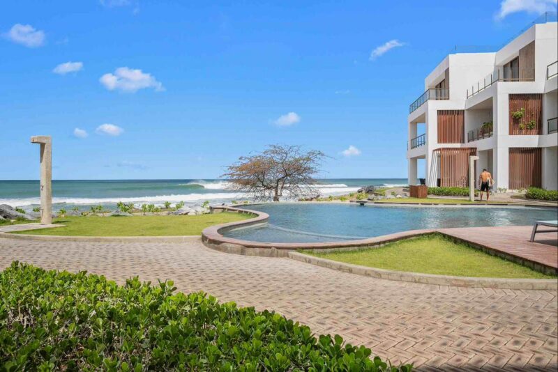 Luxury Beachfront Condo at Hacienda Iguana with an infinity pool above the Pacific