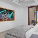 Primary bedroom with Pacific Ocean views at Hacienda Iguana
