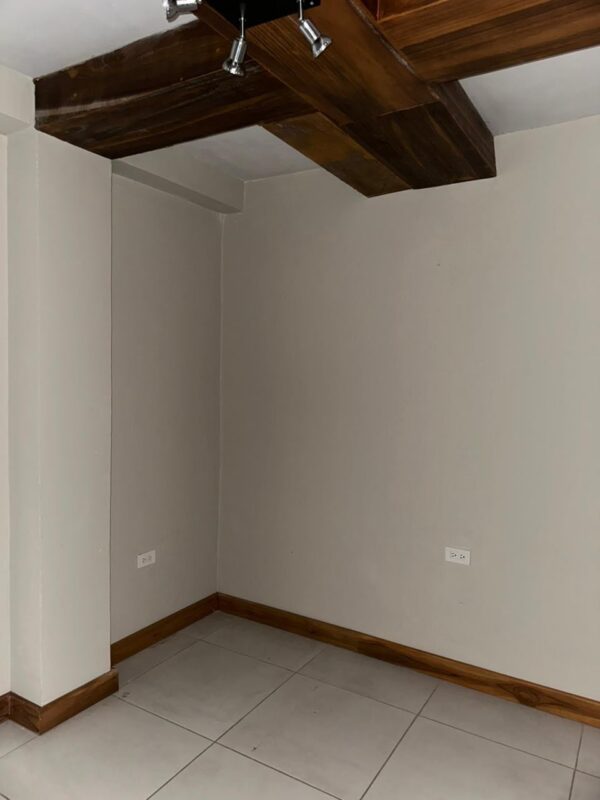 Teak trim and beams in the office interior