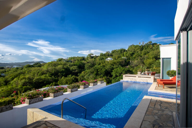 Infinity pool at the Pacific Marlin Estate looking out over the bay