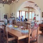 Formal dining hall with seating for a crowd