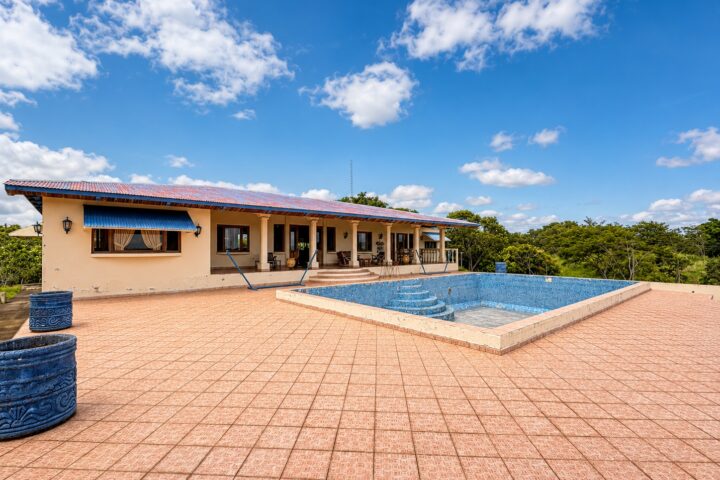 153 acre lakeview farm in Rivas — main house with swimming pool