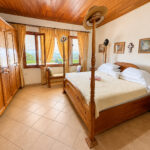 Master bedroom with a four-poster bed