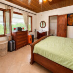Bedroom opening to the grounds