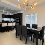 Open dining and kitchen with an island