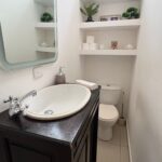 Bathroom with a vanity and modern fixtures