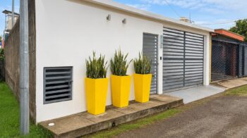 Affordable home near San Juan del Sur in Puertas del Sol, Rivas — front exterior with garage