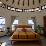 Round master suite ringed with clerestory windows at Pacific Marlin