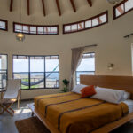 Upper-floor master bedroom of the Pacific Marlin hilltop home