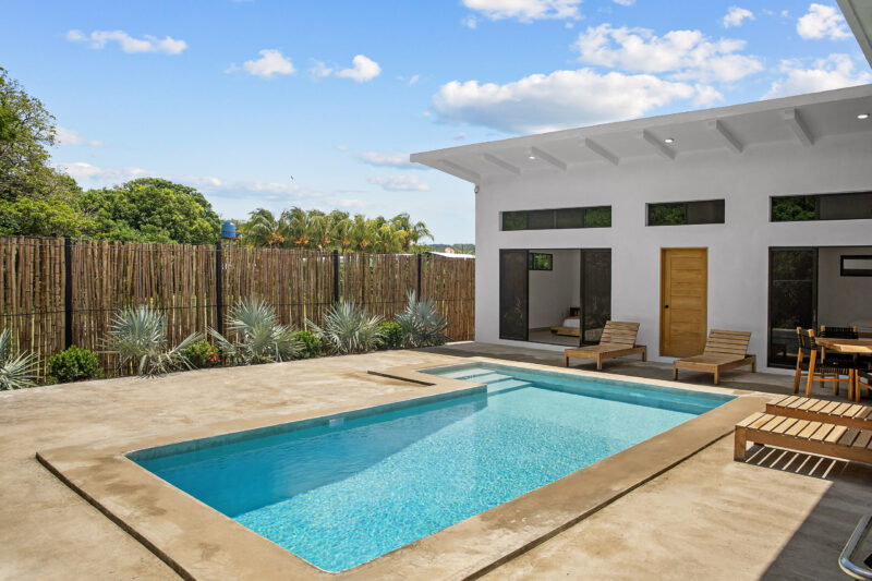 Private pool and patio beside the home