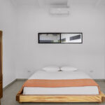 Second bedroom with a wood wardrobe