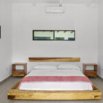 Third bedroom with a parota headboard