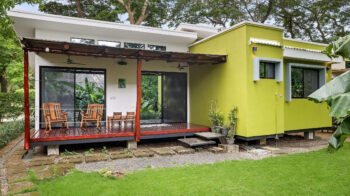 The Modern Eco Casita at Hacienda Iguana with its wood deck and garden
