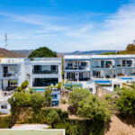 Aerial of the gated community and the bay beyond