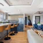 Kitchen island with bar seating and a dining table