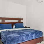 King bedroom with twin nightstands