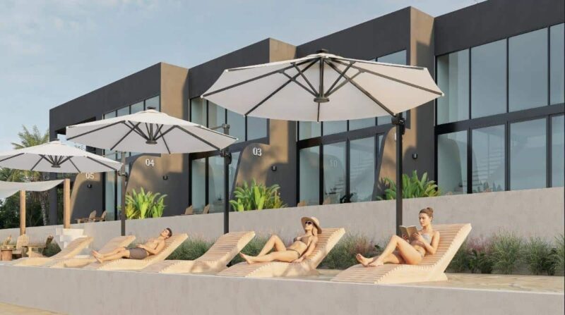 Sun loungers and shade umbrellas along the terrace