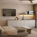Open studio layout with a compact kitchen