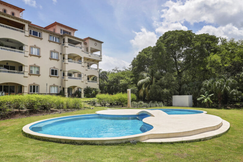 Poolside exterior of the Rio Dulce building at Hacienda Iguana